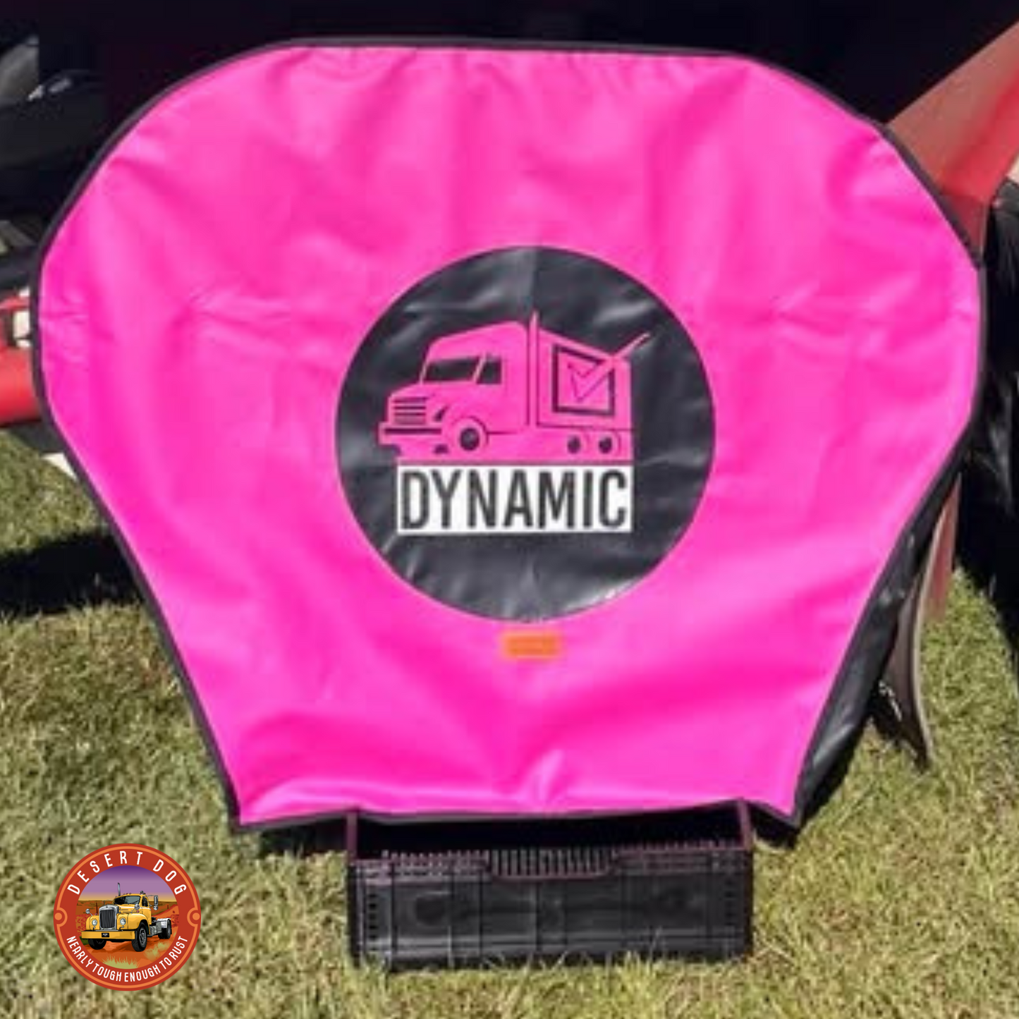 A bright pink custom Desert Dog Turntable cover featuring the Dynamic truck school logo.