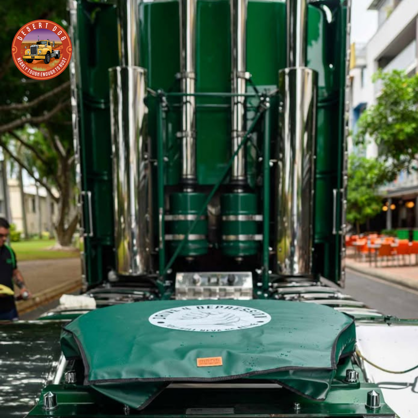 The Hulk Kenworth truck from the rear featuring a custom Desert Dog turntable cover that has the Drive 4 Depression logo printed on it.