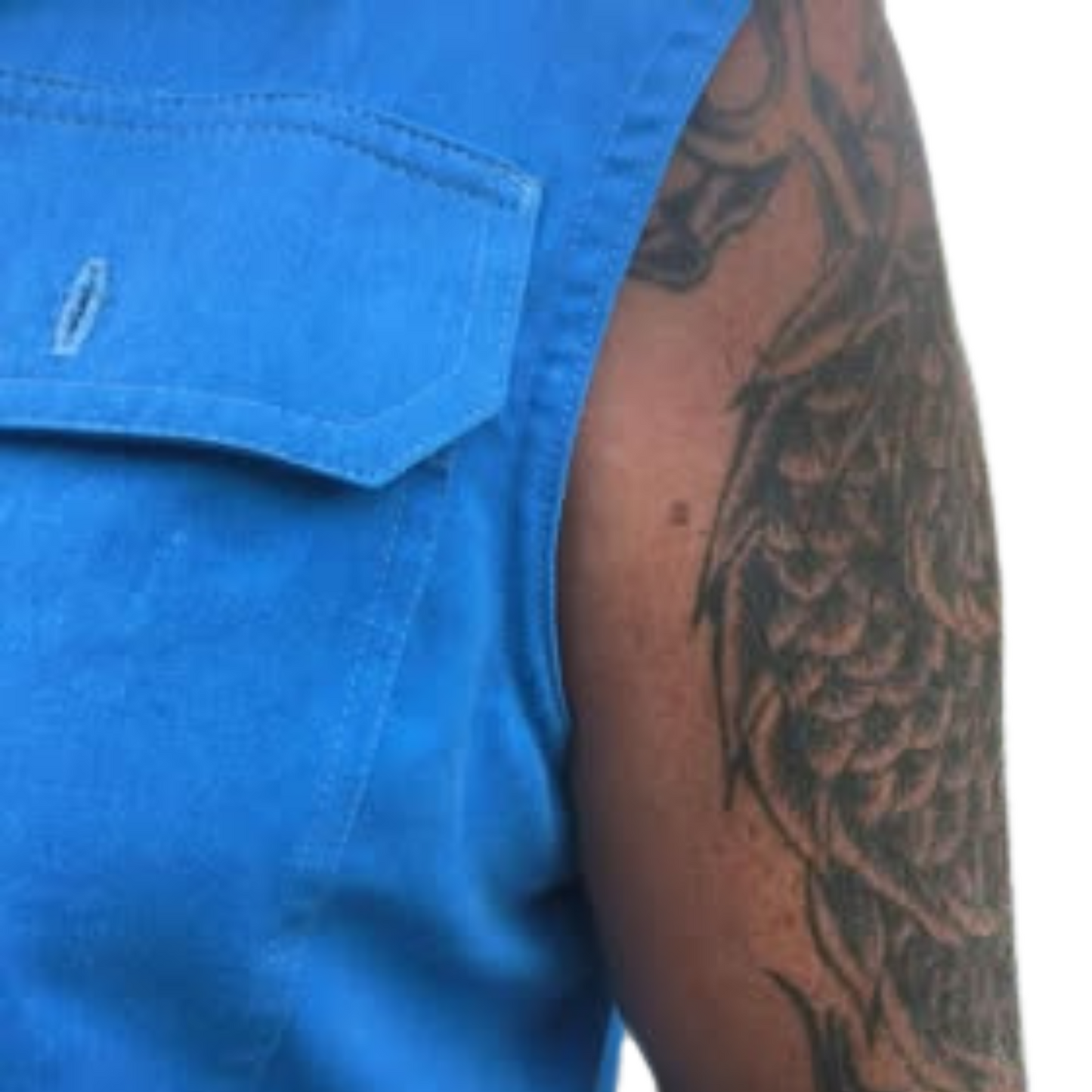 A close up detail of a tattooed man wearing a blue sleeveless Desert Dog WorkTough shirt