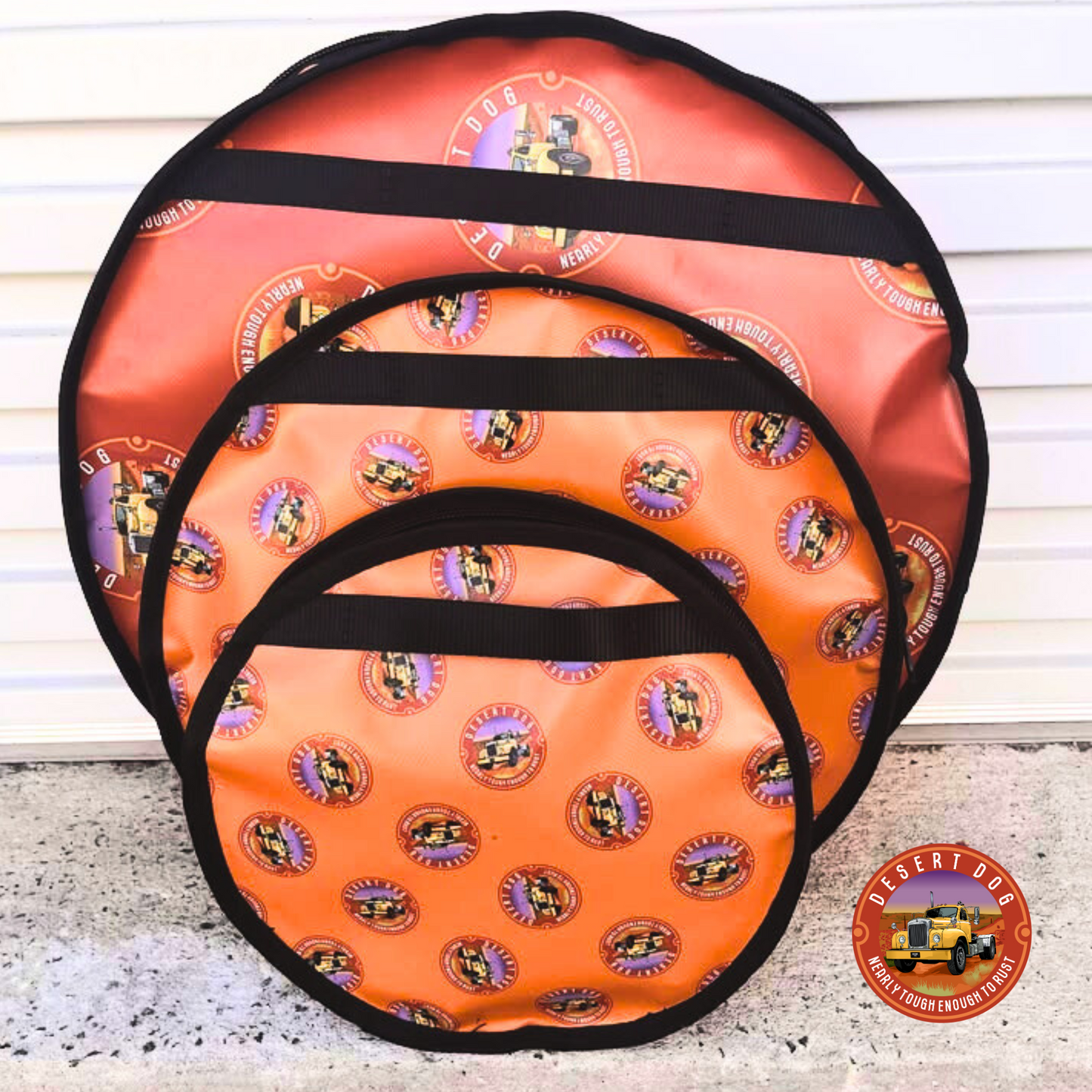 Set of three Desert Dog rop bags with logo print and black straps. All 3 sizes are shown, 30cm, 40cm & 50cm.