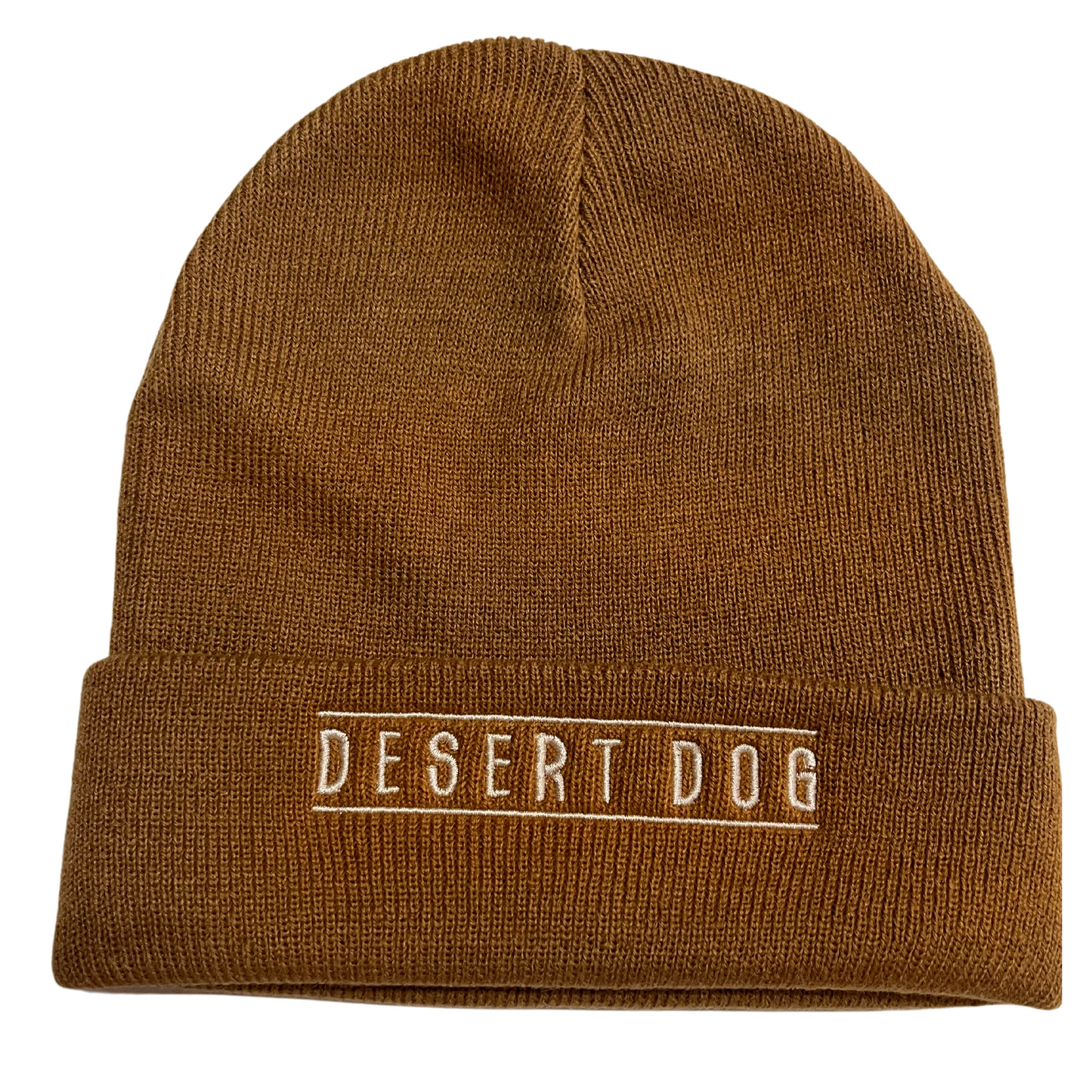 A close up photo of a gold coloured knitted beanie with the words Desert Dog embroidered on the cuff in white.