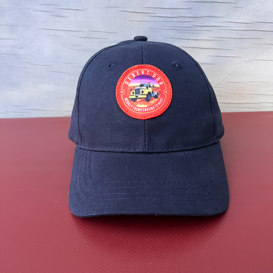 Front view of a navy kids cap featuring the Desert Dog logo with Bmodel Mack truck